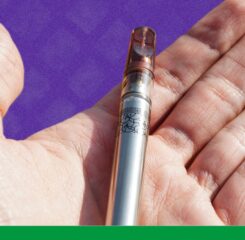 A cannabis cartridge in the palm of a hand